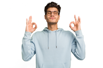 Young caucasian handsome man isolated relaxes after hard working day, she is performing yoga.