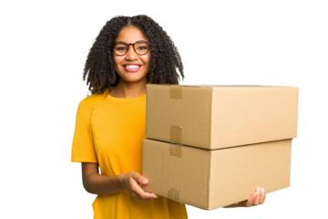Young african american woman moving to other house while picking up a box full of things isolated laughing and having fun.