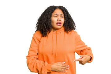 Young african american woman isolated having a liver pain, stomach ache.