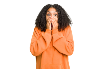 Young african american woman isolated shocked, covering mouth with hands, anxious to discover something new.