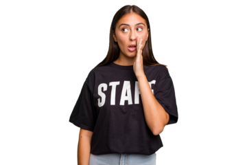 Young caucasian staff woman isolated is saying a secret hot braking news and looking aside