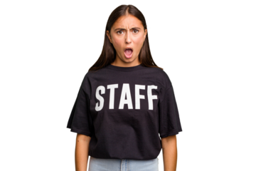 Young caucasian staff woman isolated screaming very angry and aggressive.