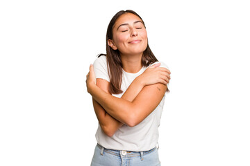 Young cute caucasian woman isolated hugs, smiling carefree and happy.