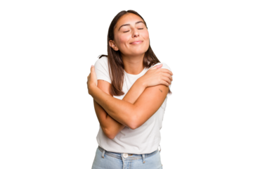 Young cute caucasian woman isolated hugs, smiling carefree and happy.