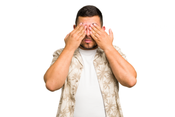 Young caucasian man isolated afraid covering eyes with hands.