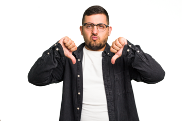 Young caucasian man isolated showing a dislike gesture, thumbs down. Disagreement concept.