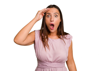 Young caucasian cute woman isolated shouts loud, keeps eyes opened and hands tense.