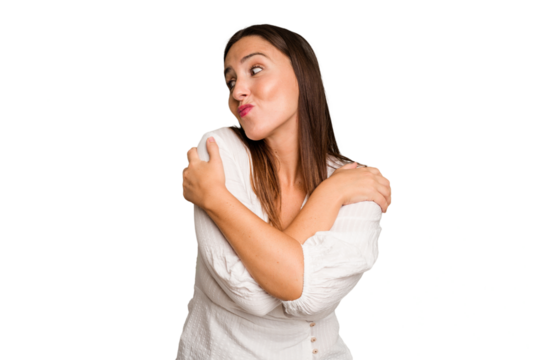 Young caucasian cute woman isolated hugs, smiling carefree and happy.