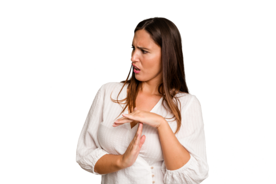 Young caucasian cute woman isolated showing a timeout gesture.