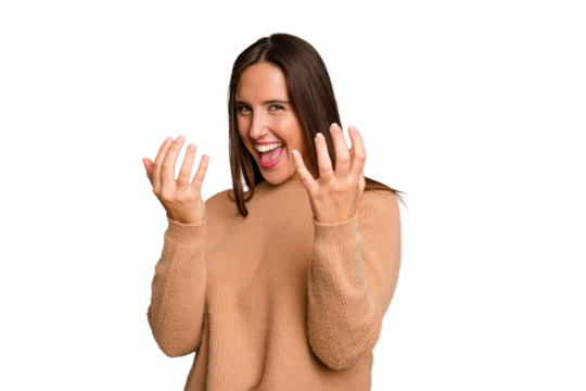 Young caucasian cute woman isolated pointing with finger at you as if inviting come closer.