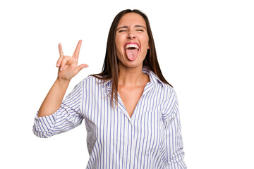 Young caucasian cute woman isolated showing rock gesture with fingers