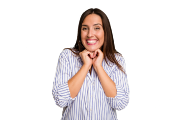 Young caucasian cute woman isolated keeps hands under chin, is looking happily aside.