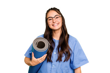 Young caucasian physiotherapist woman holding a mat isolated isolated on green chroma background...