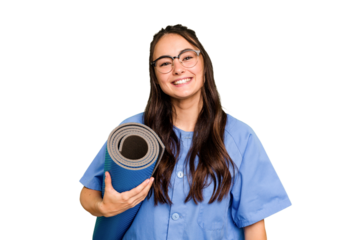 Young caucasian physiotherapist woman holding a mat isolated isolated on green chroma background laughing and having fun.