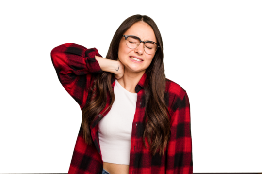 Young caucasian woman isolated on green chroma background having a neck pain due to stress, massaging and touching it with hand.