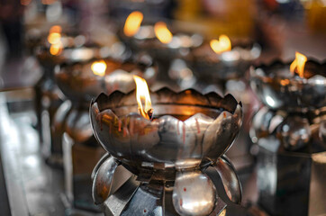 Vegetable oil lamp for lighting candles and incense to pay homage to the gods in the Chinese Naja...