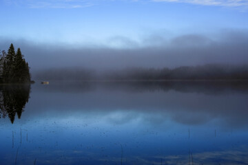 fog on the lake Jonsvatnet located in Trondheim municipality