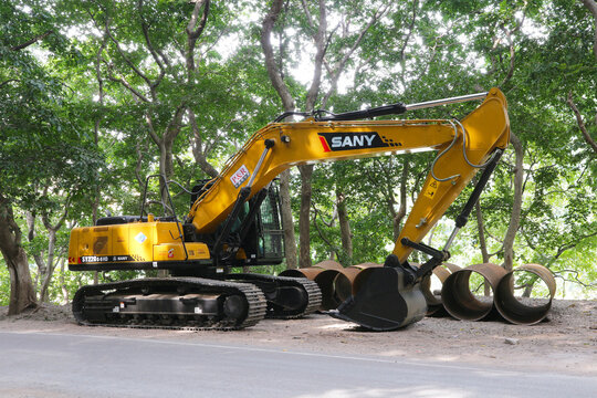 Chinese SANY crawler medium hydraulic excavator in India, Uttarakhand, Rishikesh, November 6, 2022.