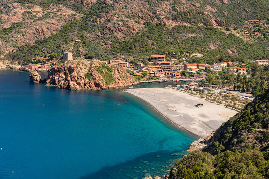 The small harbor and beach in Porto on the remote west coast of Corsica, France