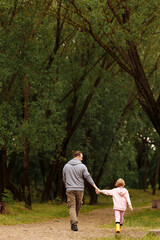 Fototapeta premium Father and daughter walking