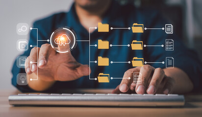 Businessman working on virtual screen of Document Management System (DMS). Software for archiving, searching, and managing corporate files and information, documentation in enterprise with ERP.