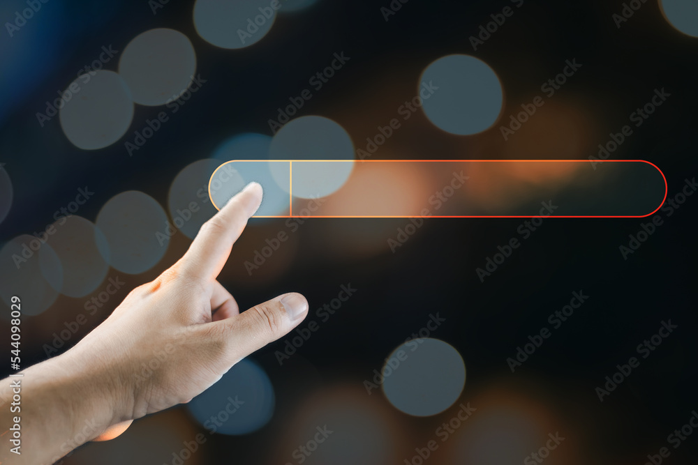 Wall mural the concept of using technology to search for information, a man's hand is using to search for infor