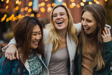 Group of female friends having fun in the city
