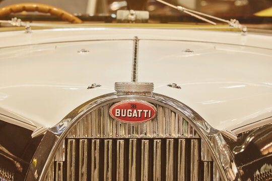 Retro styled image of a classic white Bugatti limousine car in Essen, Germany on March 23, 2022
