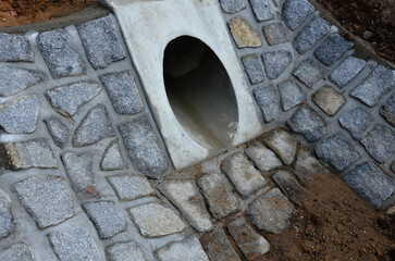 A newly built road, on the layer of which you can see successive layers of screed and asphalt...