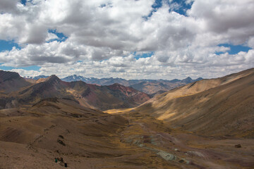 Naklejka na ściany i meble Rainbow Mountain Valley, Peru, with views of the mountains. 