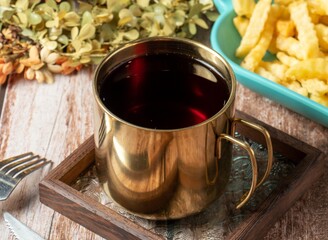 Black tea served in mug isolated on table side view of taiwan food