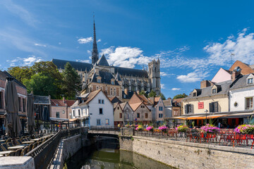 the canals of the Somme River and the historic old city center of Amiens with the cathedral in the...