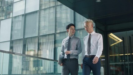 Confident business people walking in office building,4K