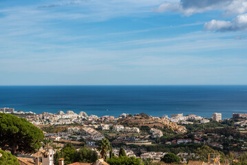 Fototapeta na wymiar View of the blue sea and the city in Malaga