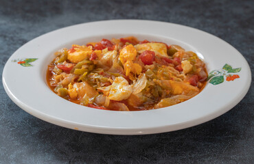 Traditional turkish food menemen made by eggs and tomatoes.