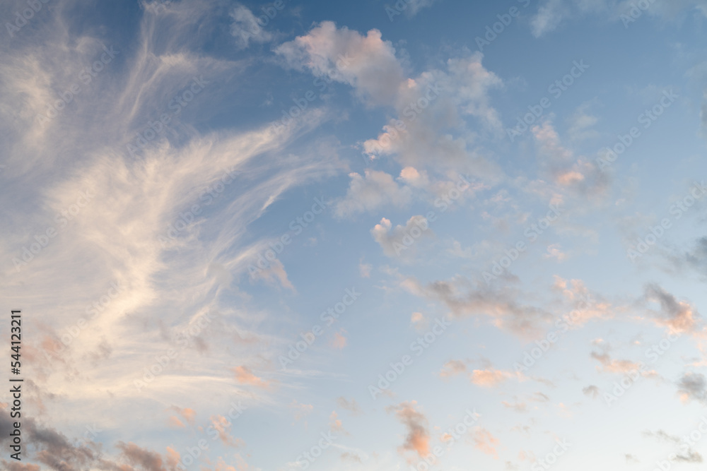 Canvas Prints cloudscape of very light and airy soft clouds at golden hour