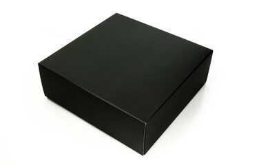 Blank black carton box isolated on white background. Closed