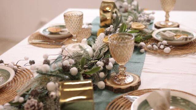 christmas table setting, Holiday setting, New year, evening table setting with Christmas decorations in the living room, New year's deck table blurred bokeh, Rustic vintage Xmas background