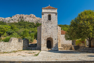 Fototapeta na wymiar Historic site and church in Jurndvor near Baska Island of Krk Croatia