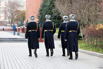 Russian soldiers on march near the Kremlin wall in Moscow. Change of the honor guard of the...