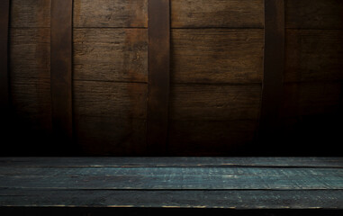 mug of beer, wheat ears, green hops and beer barrel on a wooden background. High quality photo