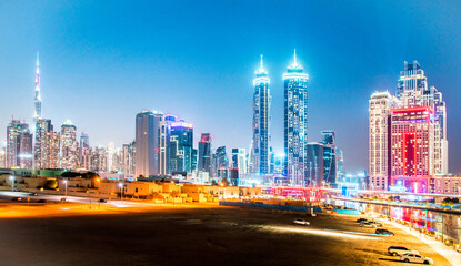 Dubai, United Arab Emirates – February 5, 2021: Beautiful incredible cityscape with skyscrapers in the old town next to the Tolerance bridge near the water canal.