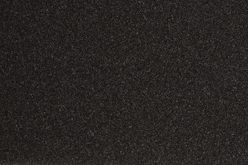 textured metal surface in dark gray color, background