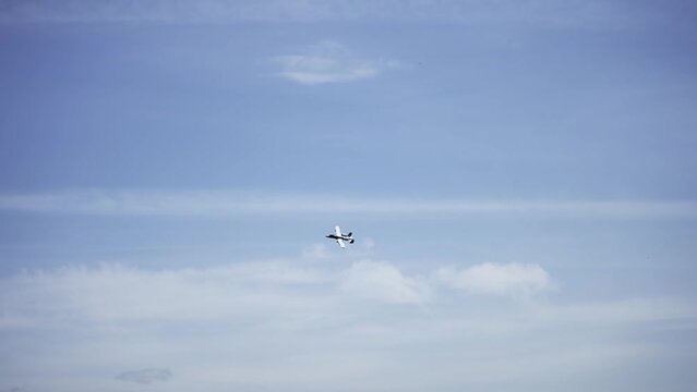 Plane military A-10 Thunderbird Warthog II flying in war zone, slow motion