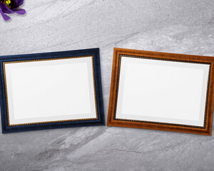 Vintage Double Horizontal Frames on marble background. Dark blue frame with blank space and Brown frame with blank space.
