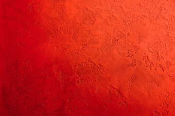 red background, decorative stucco texture