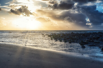 Sun sets over the island of Ameland, Holland