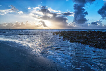 Sun sets over the island of Ameland, Holland