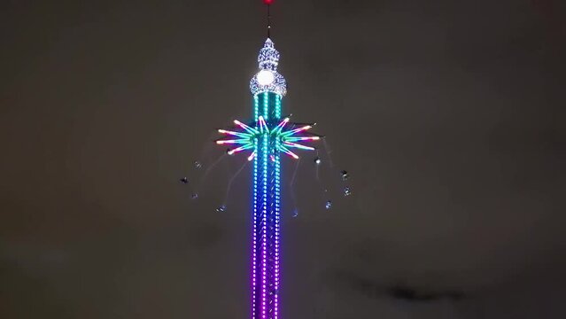 Vienna, Austria. Aerial view of Prater Park night lights. Amusement city park on a summer night from drone