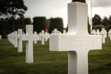 Tomb in Normandy. Cross of an unknown soldier in the American cemetery of Omaha Beach, Normandy, France. High quality photo